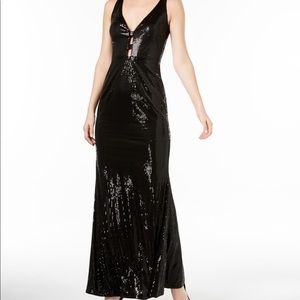 Brand new just the right amount of sexy! Sequin black long Calvin Klein dress.
